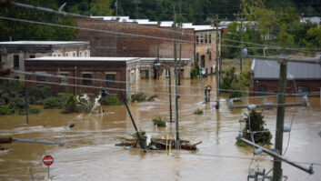 Flooding from heavy rains from hurricane Helene on a street in Asheville, North Carolina.