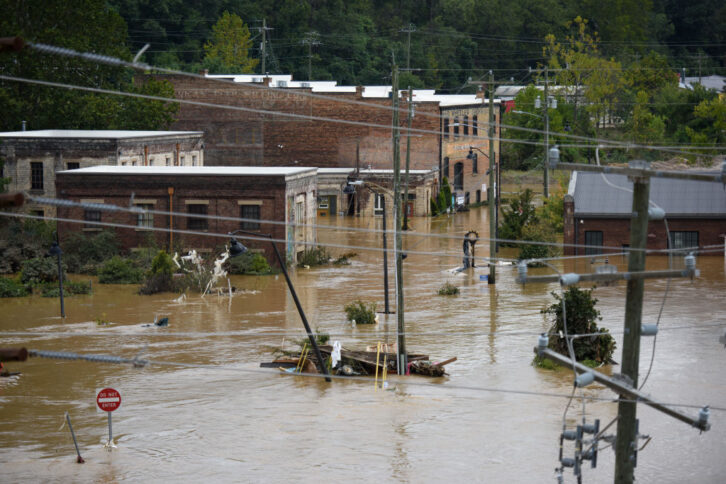 Flooding from heavy rains from hurricane Helene on a street in Asheville, North Carolina. 