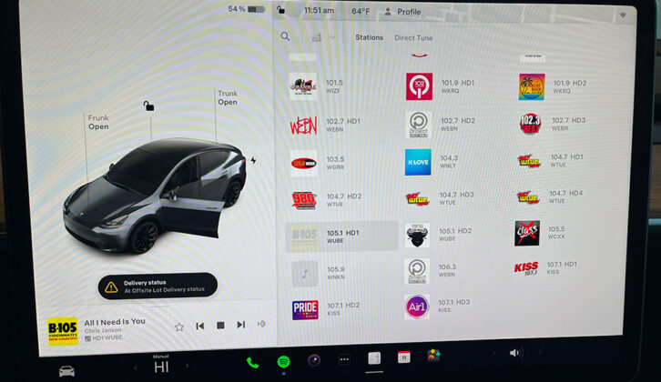 Station menu on a 2024 Tesla Model Y, tuned to Hubbard’s WUBE in Cincinnati (lower left).